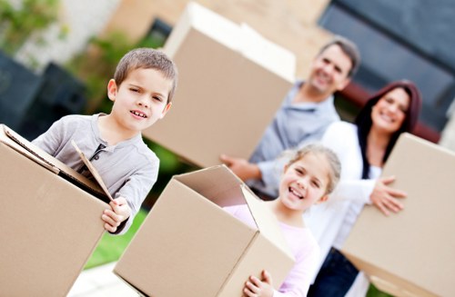 Packed household boxes ready for removals in Kilburn