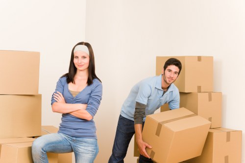 Loading furniture and boxes into a removal van in Kilburn