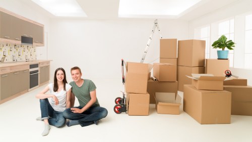 Local movers handling items for a business delivery in Kilburn