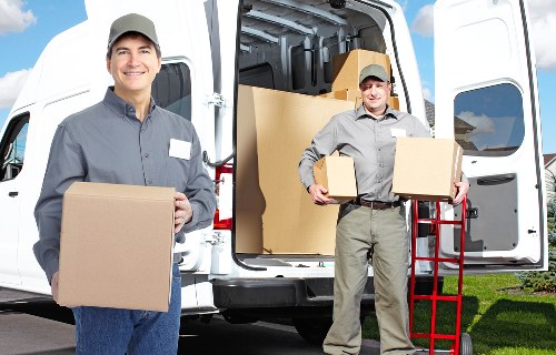 Commercial movers handling desks and office furniture in Kilburn